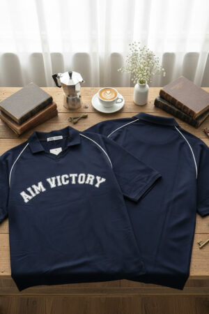 The AIM VICTORY Varsity Polo – Navy
