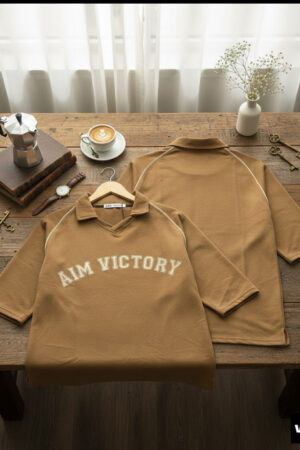 AIM VICTORY Varsity Polo drop – Heritage Camel